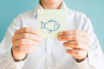 Picture icon in the hand fish