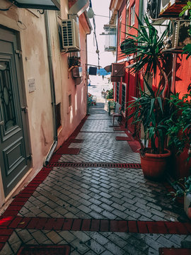 Fototapeta  Narrow streets of Parga Greece day time.