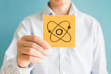 Picture icon atom in the hand