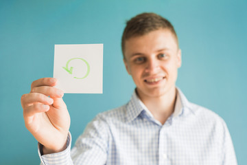 Picture icon arrows on a circle in the hand