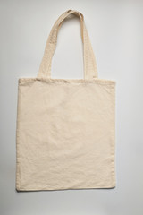 White cotton bag. Studio shot isolated on a white background, textile bag.