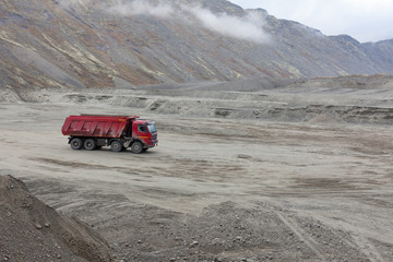Construction machinery works on quarry mining in the Khibiny mountains, Kola Peninsula