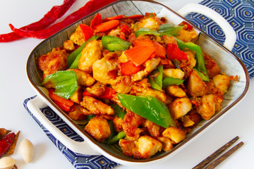 Stir fry chicken with peppers close up