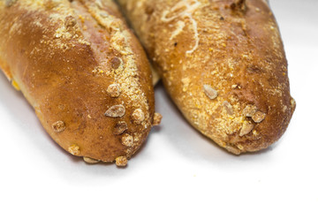 bread baguette loaf fresh cheese isolate on a white background bun flour flour malt bran wheat corn sunflower seeds baked cereals food crunch