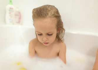 Bathing child.