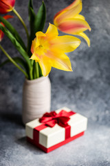 Tulip flowers on concrete background with copy space