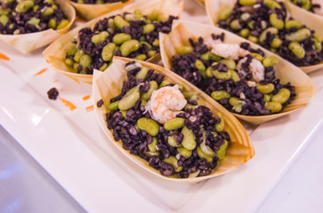 small boats with black beans and shrimp