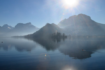 Annecy lake and sun flare