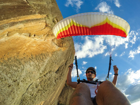 extreme paraglider man in the sky