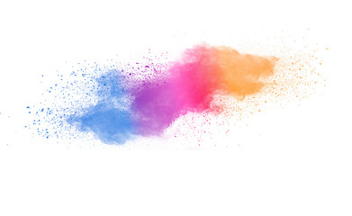 Freeze motion of colorful color powder exploding on white background.