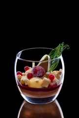 Dessert explosive taste, with fresh berries, chocolate and ice cream