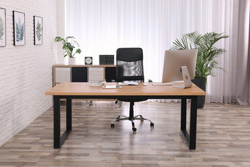 Director's office with large wooden table. Interior design