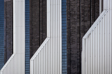 Abstract architecture wall fragment of modern urban geometry. Business building.