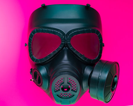black gas mask, on fuchsia background