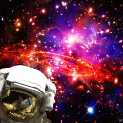 Fototapeta na wymiar Astronaut and galaxy on the backdrop. The elements of this image furnished by NASA.