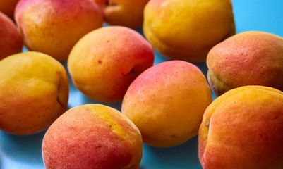 Ripe apricots on a background.