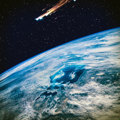 Earth and comet. The elements of this image furnished by NASA.