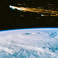 Earth and comet. The elements of this image furnished by NASA.