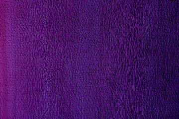 Violet leather surface. The texture of purple leather. Violet skin.