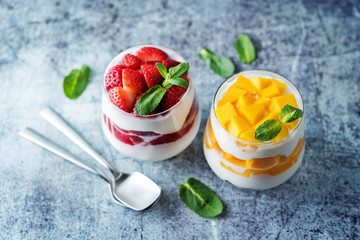 Greek yogurt strawberry and mango parfait in glasses