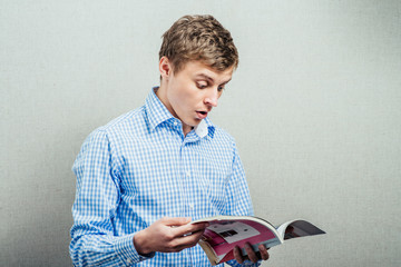 Man reading a magazine