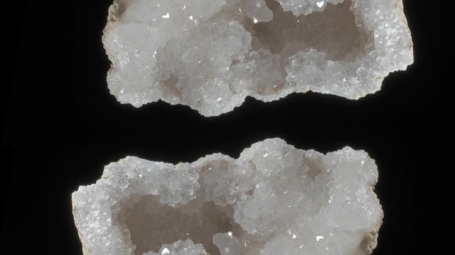 Large crystals of rhinestone quartz, rock-crystal black background. macro