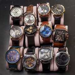 storage box with collection of men wrist watches