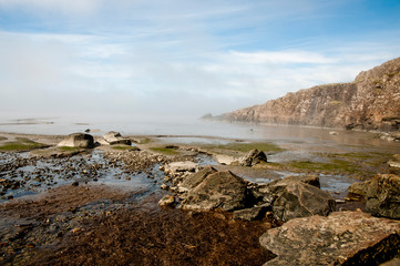 Fototapeta na wymiar beach rocks iceland clouds scenic view northern europe