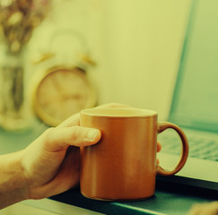 Closeup of man hand and coffee