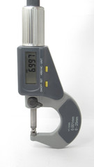 A isolated micrometer with a digital display,Located on white background,Easy to use in any work