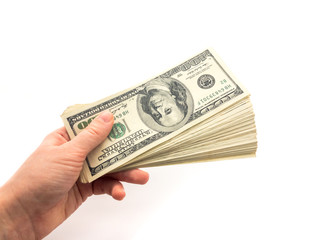 American dollars and hand isolated on white background. Paper money in hand. Business and finance.