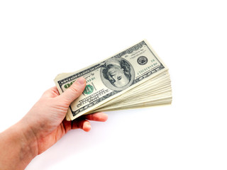 American dollars and hand isolated on white background. Paper money in hand. Business and finance.