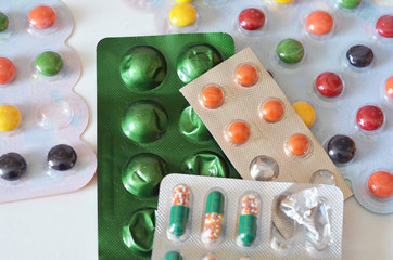 Different medicines: tablets, pills in blister pack, medications drugs, macro, selective focus,...