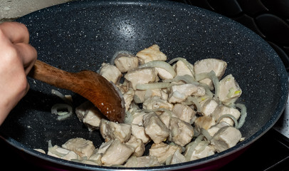 Close-up of homemade cooking chicken with creamy mushrooms