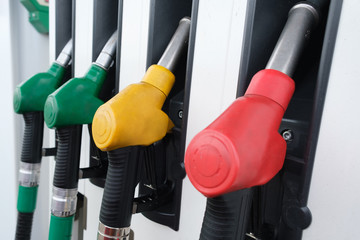 Colorful Petrol pump filling nozzles.