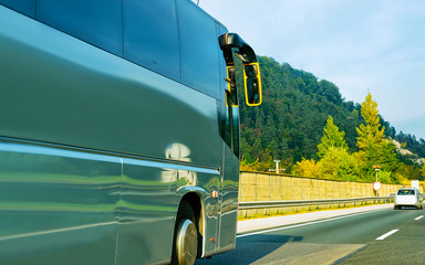 Tourist bus in road in Poland reflex