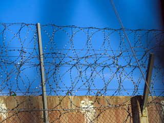 Fence Against Blue Sky