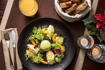 Salad with shrimp mousse, peach, quail egg