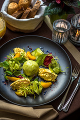 Salad with shrimp mousse, peach, quail egg