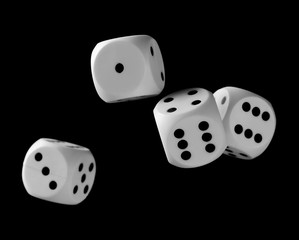 White playing, gambling die, dice for tabletop games and poker isolated on black background with clipping path