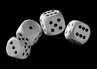 White playing, gambling die, dice for tabletop games and poker isolated on black background with clipping path