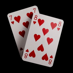 Classic playing cards for poker, gambling and casinos isolated on black background with clipping path