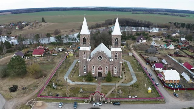 Drone shot on Catholic church of St. Iosif in Rubegevich, Belarus. Aerial view on catholic church architecture.
