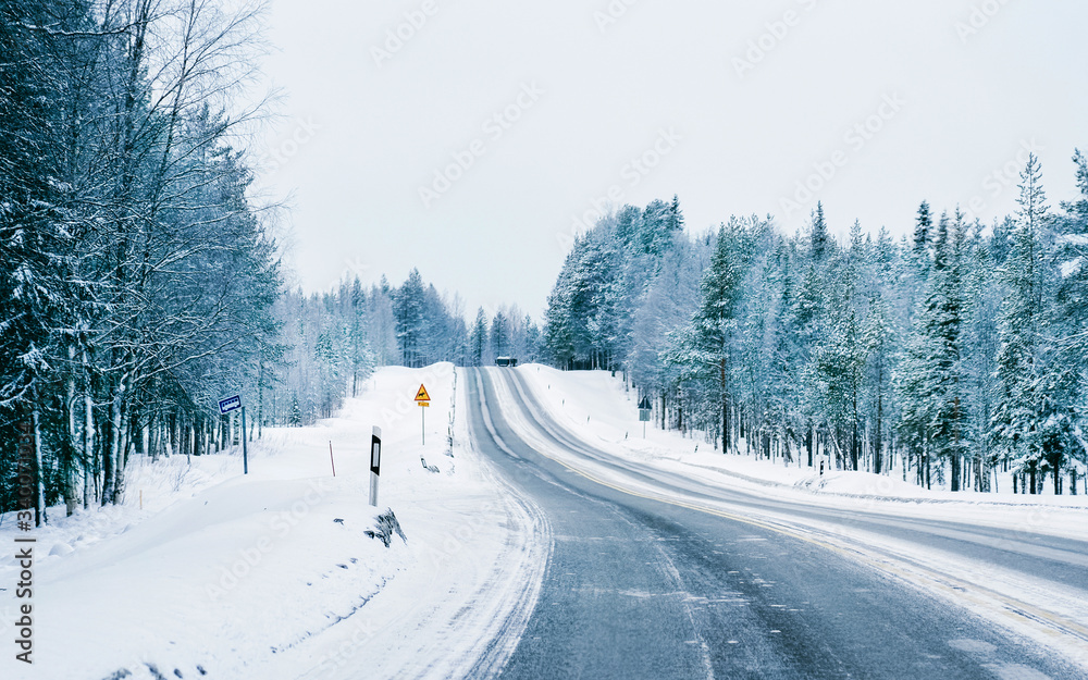 Sticker Road at snowy winter Lapland reflex