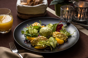 Salad with shrimp mousse, peach, quail egg