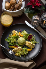 Salad with shrimp mousse, peach, quail egg