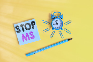 Writing note showing Stop Ms. Business concept for treat the condition that can affect the brain...