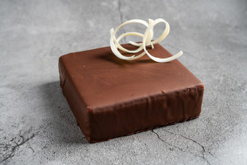 Pigeon's milk cake on grey background