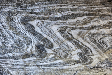 Abstract gray texture of natural, raw salt in an underground salt mine