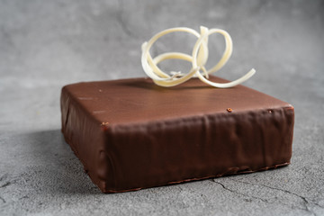 Pigeon's milk cake on grey background